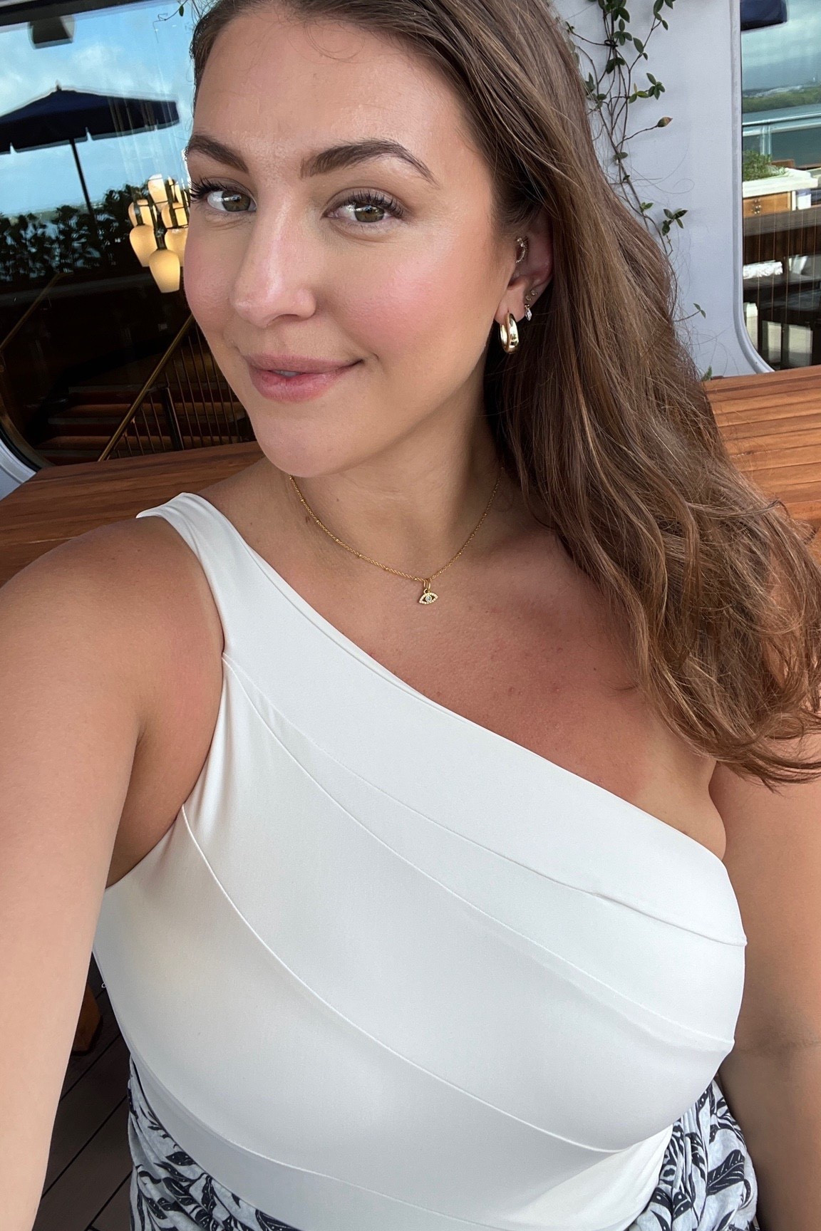 This one-shoulder white one-piece is just as good up close as it is full length. The neckline is incredibly flattering, the fabric smooths without flattening, and it gives that clean, elevated look that works for pool days and resort dinners with a wrap skirt. Chic, timeless, and confidence-boosting.

Keywords: one shoulder swimsuit, white one piece swimsuit, flattering one piece swimsuit, smoothing swimsuit, sculpting swimsuit, tummy control swimsuit, elegant swimwear, luxury looking swimsuit, resort swimwear, cruise swimwear, vacation swimsuit, mid size swimwear, size 12 swimsuit, size 14 swimsuit, minimalist swim style, classic swimwear, women’s one piece swimsuit

#LTKootd #LTKselfcare #LTKfoodie