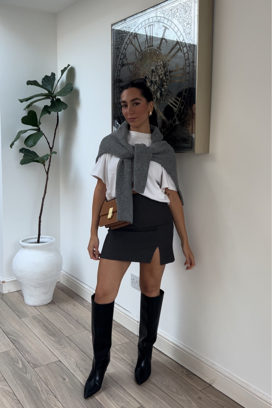 Oversized t-shirt, white t-shirt, jumper over shoulders, grey jumper, grey sweater, grey knit, pinstriped skirt, mini skirt, knee high boots, croc boots, tan bag, crossbody bag, celine dupe, h&m, marks&spencer, asos, anthropology 

#LTKstyletip #LTKworkwear #LTKSeasonal