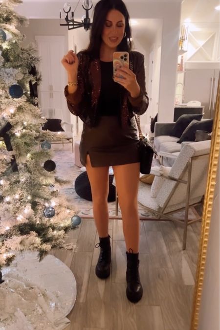 An espresso chocolate brown sequin cropped blazer paired with a faux leather brown skort! Might just be my favorite holiday look yet! I added combat boots and gold accessories with my favorite YSL top handle purse. Happy holiday shopping! 
.
.
.
#holidayoutfit #partyoutfit #skort #sequins #chocolatesequins #brownsequins #LTKHoliday

#LTKSeasonal #LTKparties