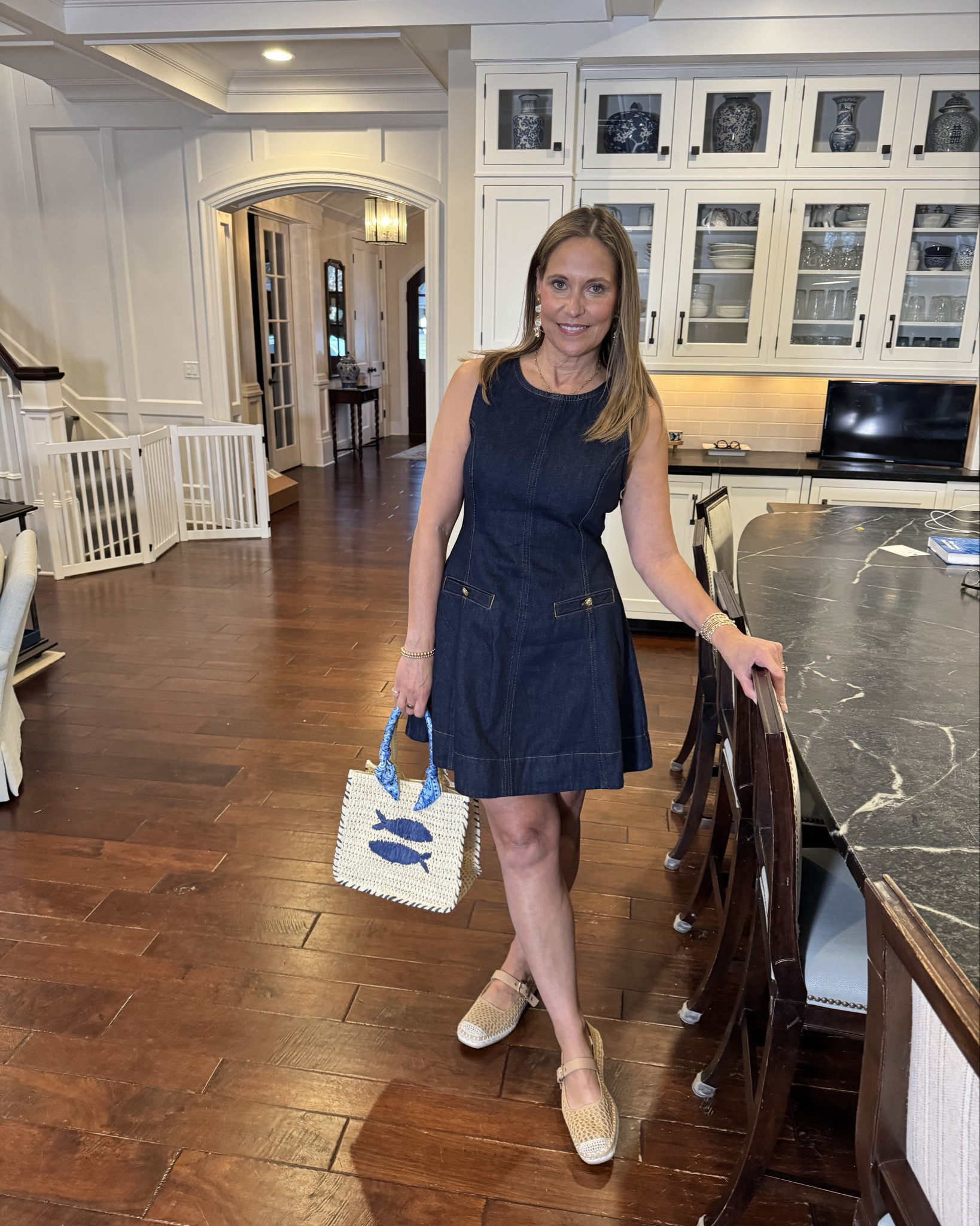 I’m absolutely loving the coastal vibes with this denim dress paired with a raffia tote bag and shoes! This ensemble radiates effortless charm, and you’ll be pleasantly surprised by how affordable the entire outfit is. It’s the perfect combination of style and budget-friendly fashion for those sun-soaked days! s

#LTKMidsize #LTKOver40