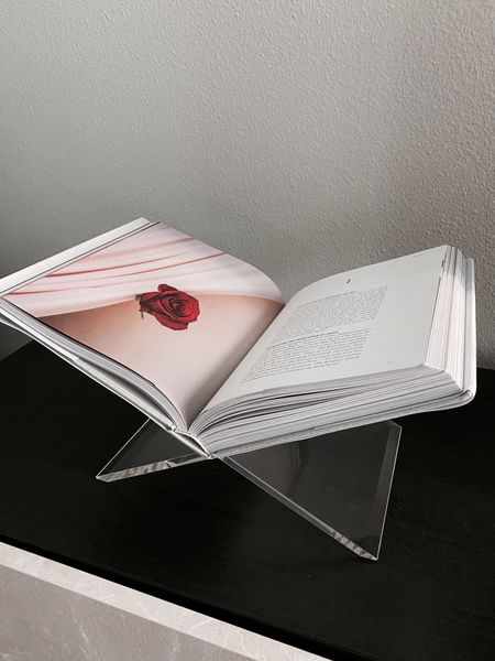 An inexpensive way to change up your decor is to get an acrylic book stand and use one of your favorite coffee table books!

When you’re in the mood for change, just flip to a page that you feel speaks to you!

This is what mine looked like this past week for Valentine’s Day!

#LTKunder100 #LTKhome