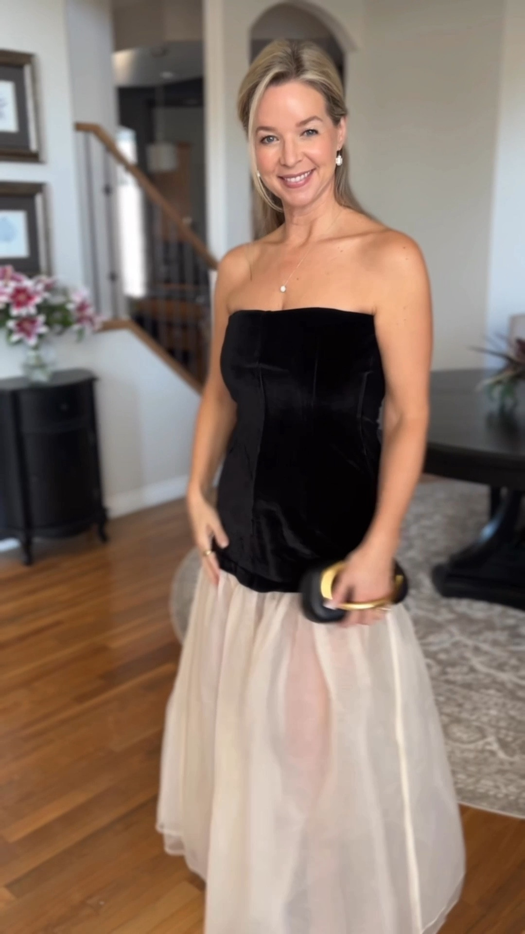 This dress has a strapless, velvet top that goes down to the top of the thigh. From there, the tulle skirting begins.
This is such a pretty, flirty dress! 

Lovely for an evening out or a Christmas party! 

Wearing size M


#LTKOver40 #LTKFindsUnder100 #LTKHoliday