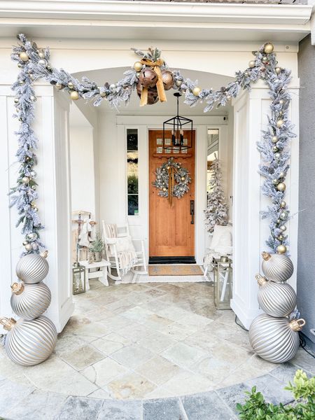 A silver and gold Christmas front porch 

#LTKSeasonal #LTKHoliday #LTKhome