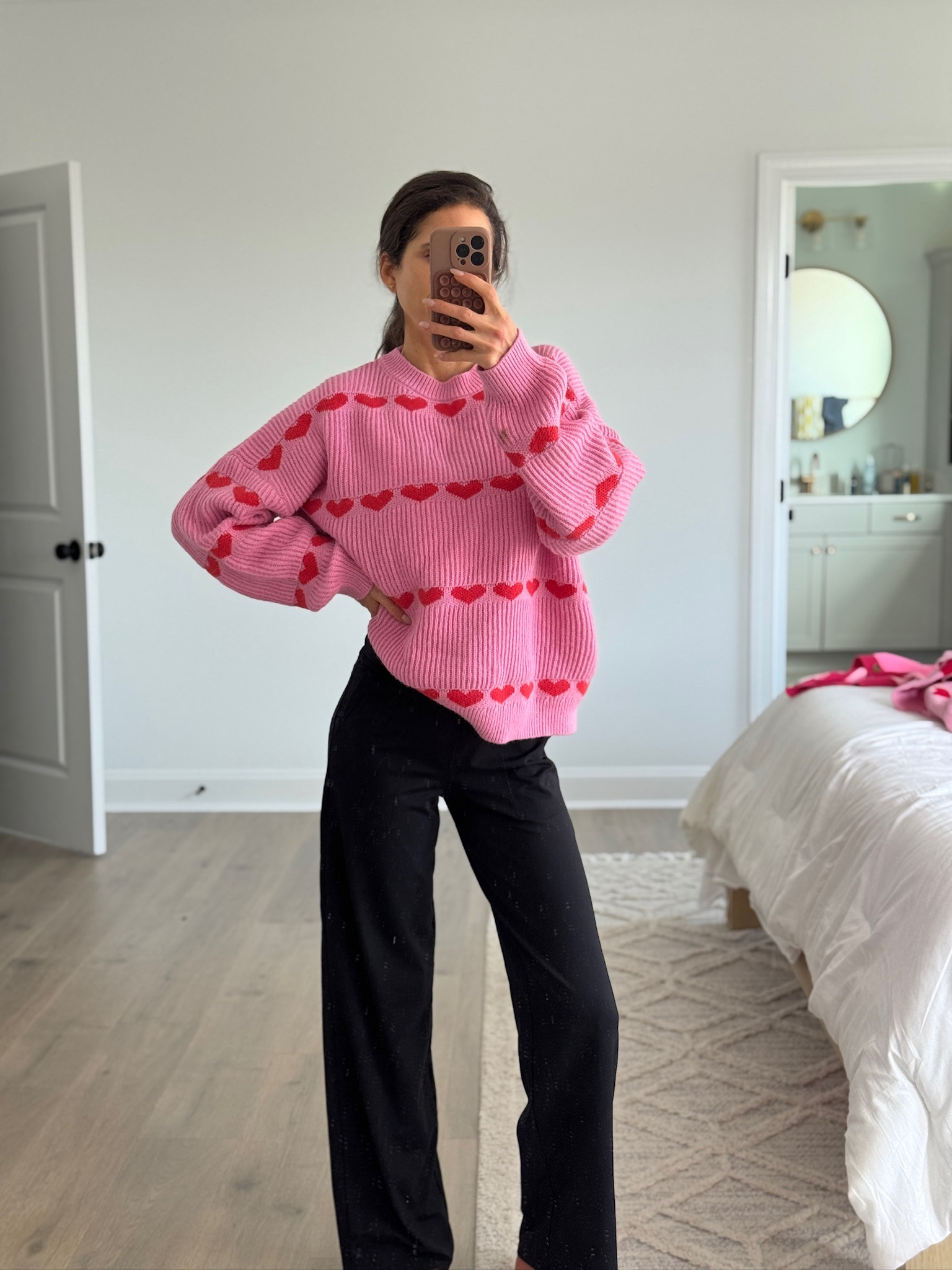 Cozy statement sweater that adds instant personality to a simple outfit. Soft knit with an oversized fit and playful heart detail, styled with wide-leg pants for an easy, comfortable look. Perfect for everyday wear when you want something fun but still effortless. Great for casual outings, errands, or a relaxed day at home.

Casual outfit, everyday outfit, heart sweater, pink sweater, oversized knit sweater, cozy outfit, wide leg pants, statement sweater, casual chic style, mom outfit, affordable fashion

#LTKSeasonal #LTKootd #LTKFindsUnder50