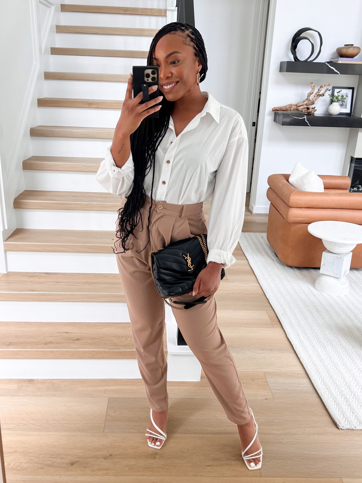 Simple way to style a white button down 🤍 throw on a pair of trousers, some heels, a few accessories  and you are good to go! 

#LTKstyletip #LTKunder100 #LTKworkwear