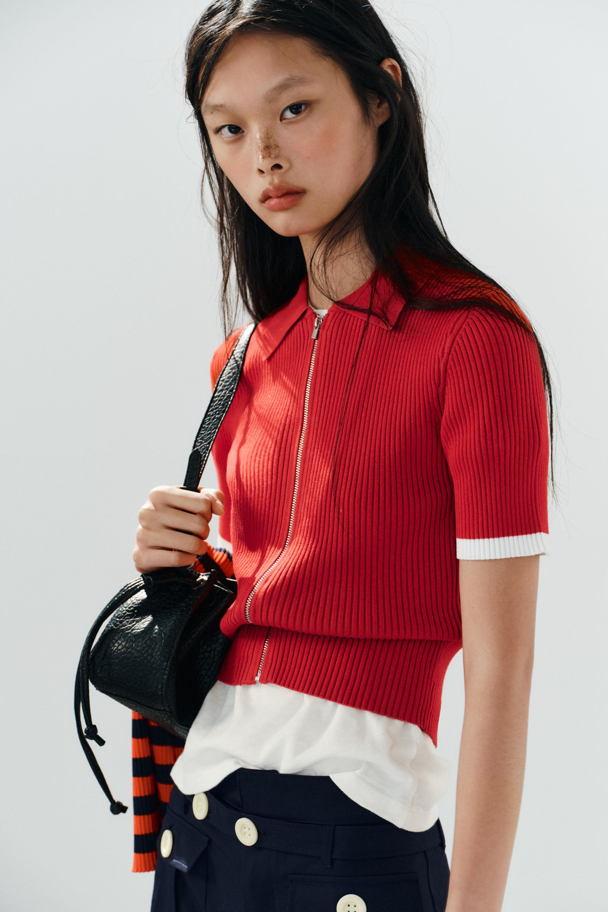 Short-sleeve polo shirt top. Front zipper closure. | Zara US