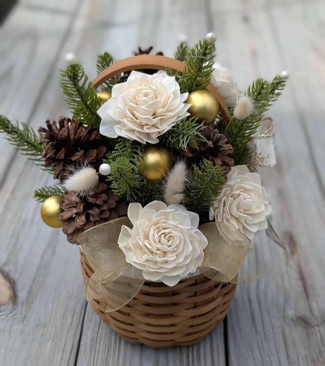 Add a cozy, rustic touch to your holiday décor with this handcrafted chipwood basket arrangement from KeloWoolCreations. Filled with lush artificial pine branches, sola wood flowers, festive ornaments, and hand-picked Colorado pine cones, it brings a warm and welcoming seasonal feel to any space. Measuring about 10” tall and 8” wide, it’s perfect for gifting or displaying on tables, shelves, and entryways. A charming way to share holiday cheer! #EtsyFinds #ChristmasDecor #HolidayArrangements #RusticHoliday #WoodFlowers #LTKHoliday #LTKHome #KeloWoolCreations

#LTKHoliday #LTKSeasonal #LTKHome