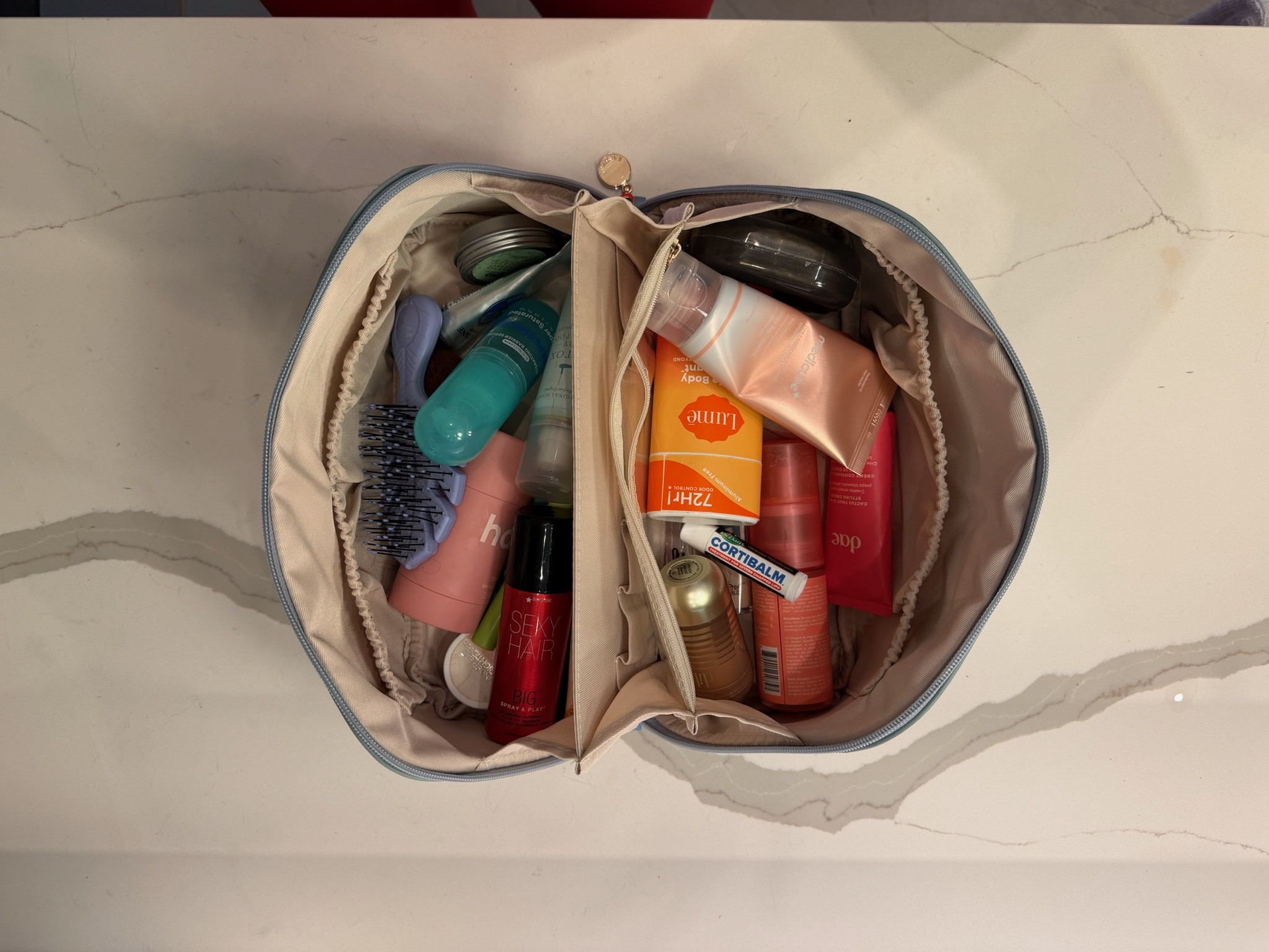 really love this toiletry bag - when you unzip it sits flat so you can see everything inside / under $30, this is the large

#LTKTravel #LTKBeauty #LTKgrwm