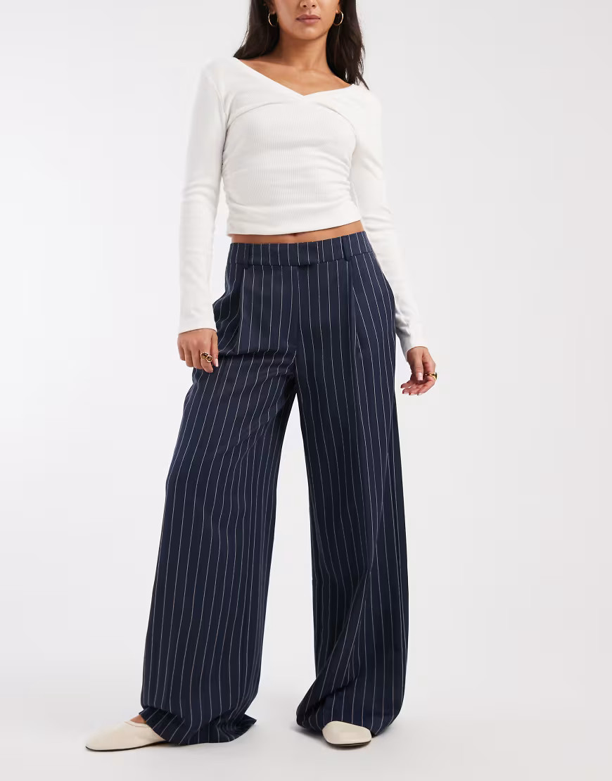 ASOS DESIGN tailored low rise wide leg mansy trousers in navy pinstripe | ASOS (Global)