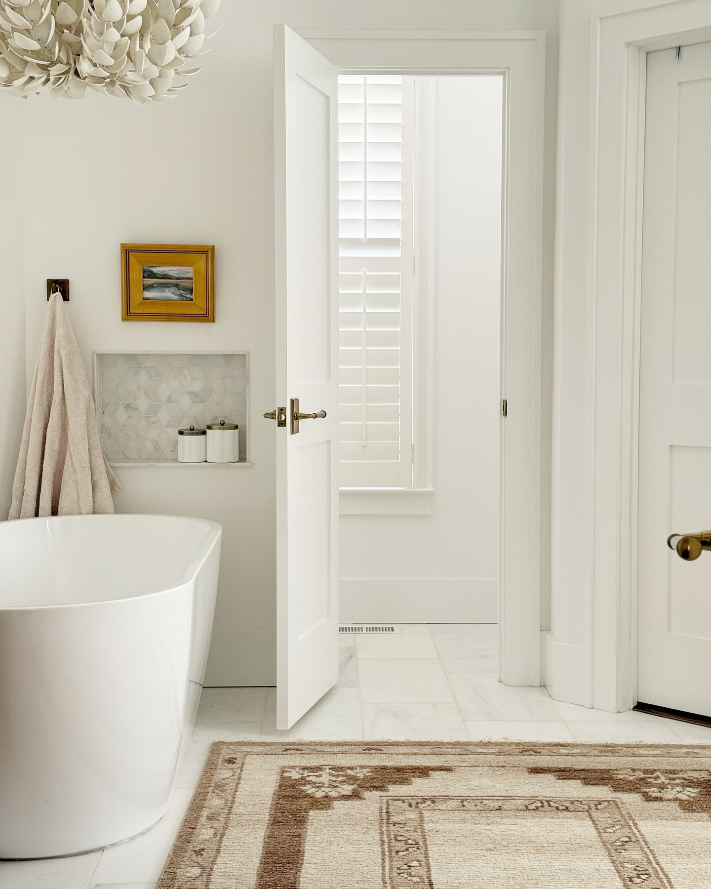 I knew this rug would have a space in our home, just did some shuffling to get it right! Our bathroom is such a weird shape and it complete the look for us 🤍. Target vintage rug for less. Shop the brown neutral rug below