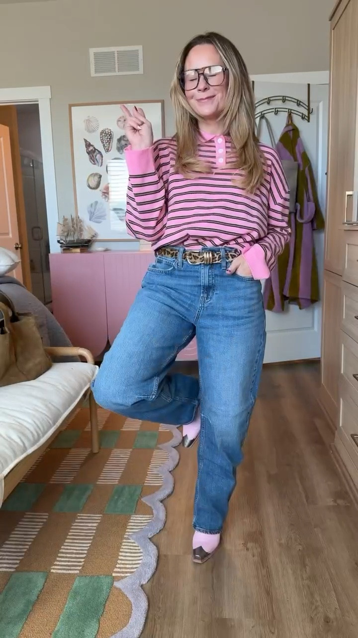 This might be my new favorite everyday combo 💗

A slightly oversized striped polo + perfectly broken-in straight leg denim = effortless but styled. The pink makes it feel fun and fresh, and the structured jeans keep it from looking too casual.

I love that this top gives cozy energy but still feels polished enough for lunch, errands, or casual Friday. And these jeans? The fit is chef’s kiss — high rise, flattering through the waist, and that classic straight leg that goes with everything.

Fit notes:
• Top runs relaxed (size down if between)
• Jeans are true to size with a great structured feel
• Such an easy tuck or half-tuck moment

Linking everything here 🤍 This is one of those outfits you’ll wear on repeat.