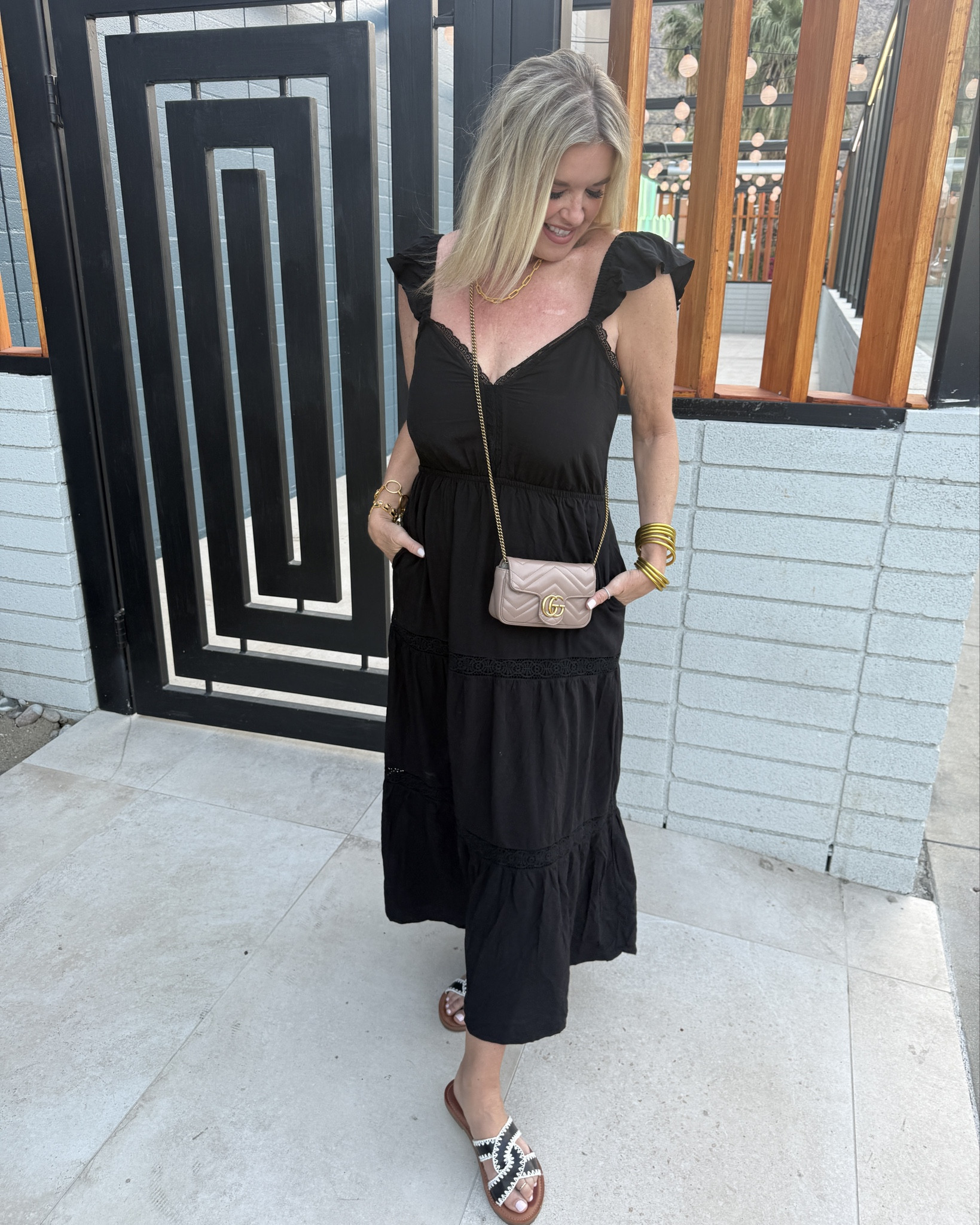 New dress launch … 

Use my Code DARCY20 to save 20%off on Gibsonlook 

This darling black sundress with ruffled cap tank sleeve , has pockets and 3 tired and fits true to size. I am in a size small

Brand new style launch by Yellow box
These stitched sandals are so cute … and comfy 
They’re a sandal you’ll wear all summer long with dresses, shorts and pants 

Gucci Marymount bag 

Budha girl bracelets 

Gold hoop earrings & 2 brackets by Julie voz


#LTKStyleTip #LTKSaleAlert #LTKShoeCrush