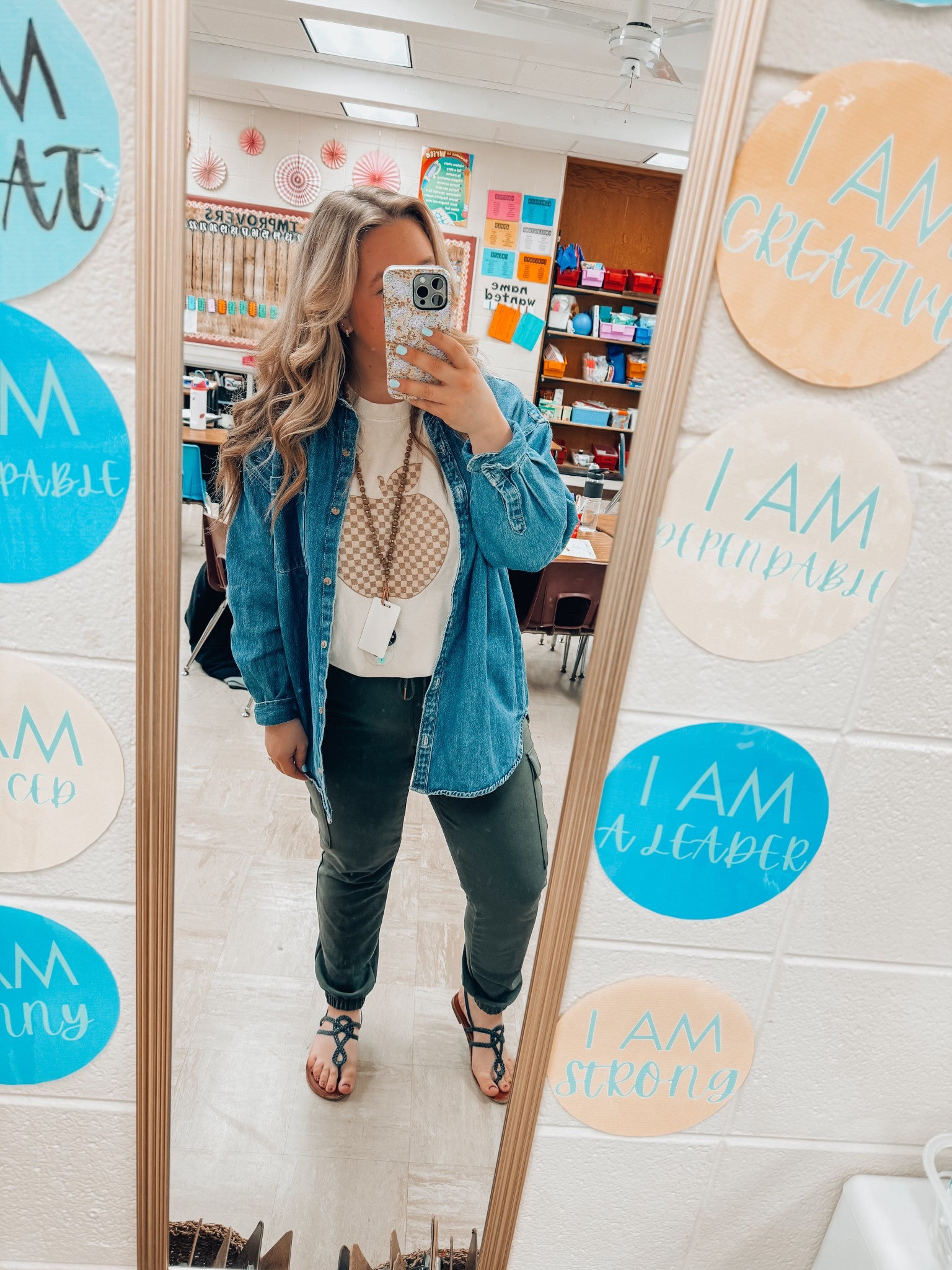 Cute casual teacher look - checkered apple teacher graphic tee - oversized button down denim shirt - flattering and comfortable joggers for teachers - spring sandals 

#LTKPetite #LTKMidsize #LTKFindsUnder100