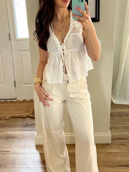 Spring outfit, spring fashion, neutral outfit, American eagle, cream trousers

#LTKstyletip #LTKSeasonal #LTKfindsunder100