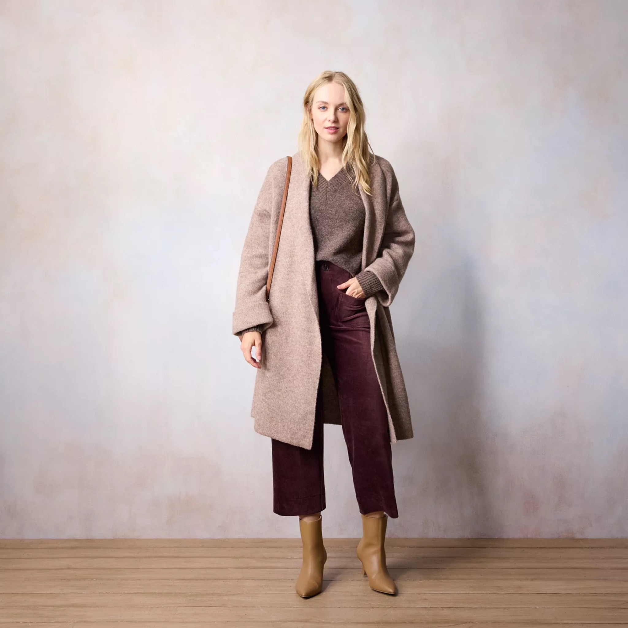 This looks just like the Anthropologie sweater! I’m going to order in black  