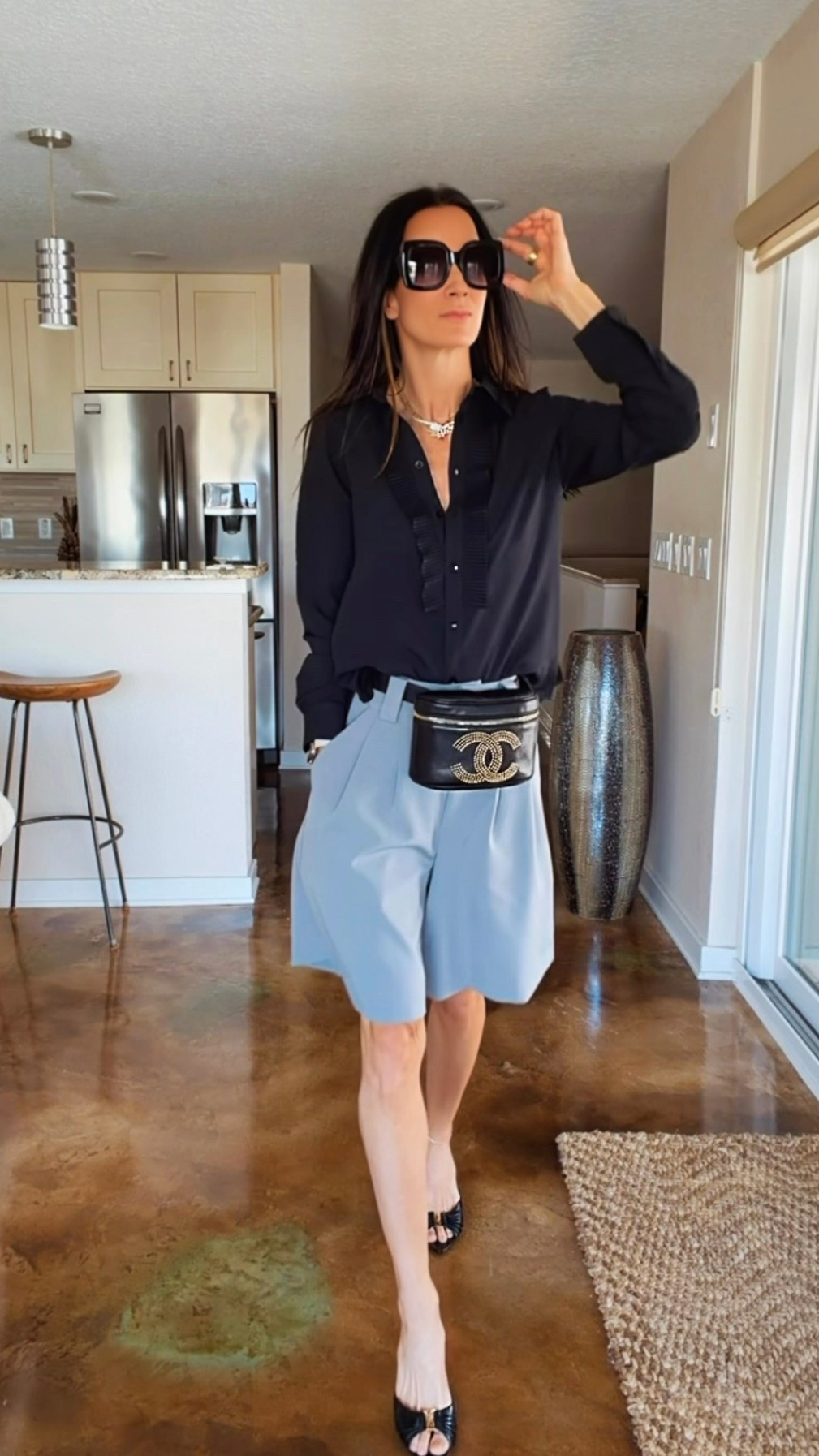 There’s something about an all-black moment that just hits differently.

This tux blouse has that perfect mix of classic and dramatic, and paired with these tailored shorts it gives a little effortless chic energy. 🖤

I kept everything else simple — oversized sunnies, a few layered chains, and this vintage Chanel belt bag that might be one of my favorite pieces in my closet.




#NicoleColeeStyle
#EffortlessChic
#LuxuryStyle
#Over40Style
#LTKFinds




#LTKdayinmylife #LTKootd #LTKgrwm
