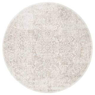 Evoke Ivory/Taupe 7 ft. x 7 ft. Distressed Border Medallion Round Area Rug | The Home Depot