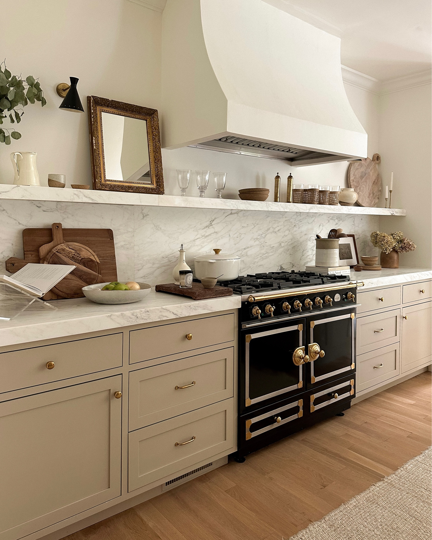 Kat Jamieson shares her farmhouse kitchen. Decor, oven, stove, range, marble, lucite.

Mirror is vintage, pottery is vintage.

#LTKhome