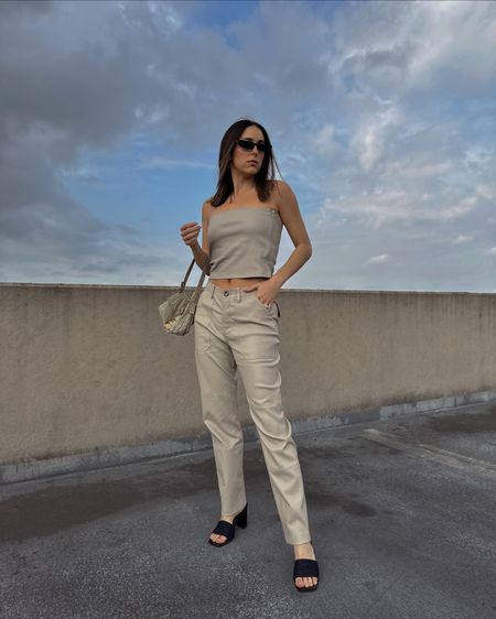 Got that Friday feeling 🪩 

Going a little extra with a leather tube top and leather trousers because why not?! 🤩 

Outfit: SPRWMN 
Bag: Vintage Fendi Baguette
Shoes: Vintage Chanel Denim 

🛍️Linking this look to shop in stories (saved to OOTD highlight) and bio- and these pants are 50% off right now!!

#sprwmn #iamsprwmn #leatherpants#cargopants #cargotrend #straightlegpants #minimalstyle #minimalfashion #effortlessstyle #neutralstyle  #minimalchic #trendyoutfits #effortlesschic #scandistyle #fallfashiontrends  #newyorkstreetstyle #discoverunder50k #springtrends#effortlesschic #minimaloutfit #90sfashion #stylingreel #fashionreel #chaneldenim #fendibaguette #vintagefendibaguette 

#LTKSeasonal #LTKSale #LTKFind