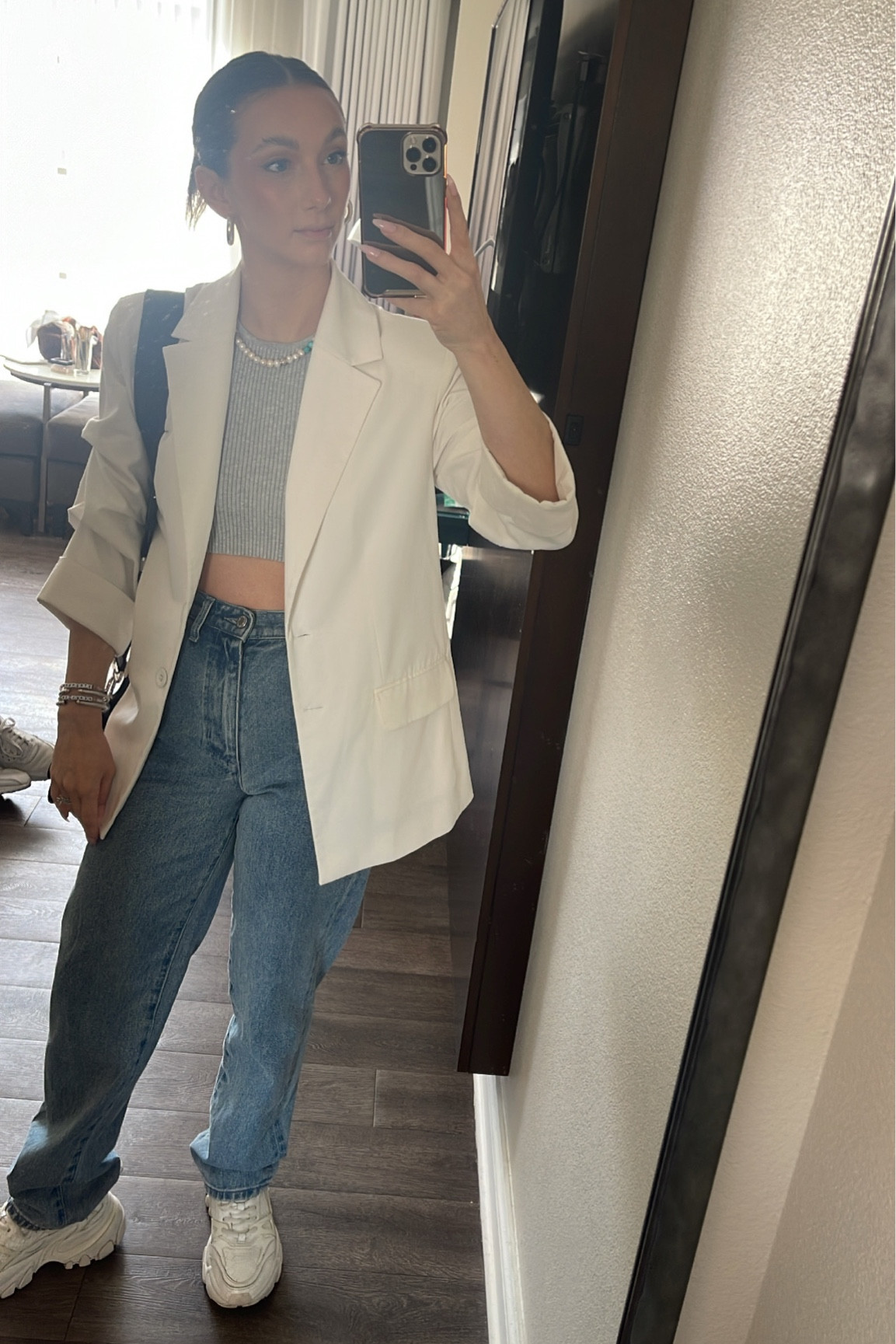 Causal shopping 
Cream blazer, crop top, jeans, chunky sneakers 

#LTKSeasonal #LTKtravel #LTKstyletip