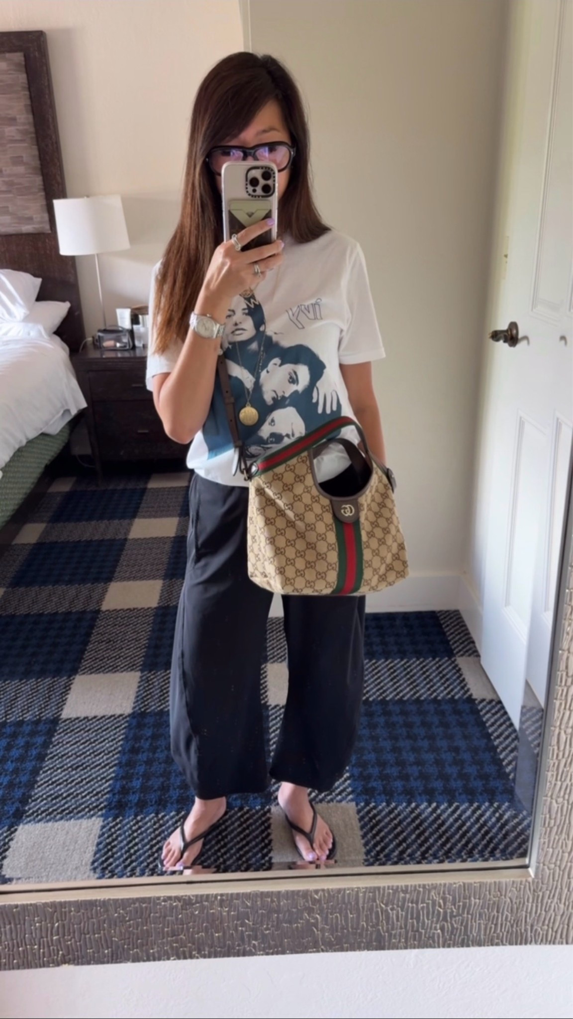 Today’s easy vacation outfit. 🤍 Graphic tee, comfy barrel wide-leg pants, flip flops, and the Gucci Giglio that’s been coming with me everywhere lately.

#LTKootd #LTKOver40 #LTKdayinmylife