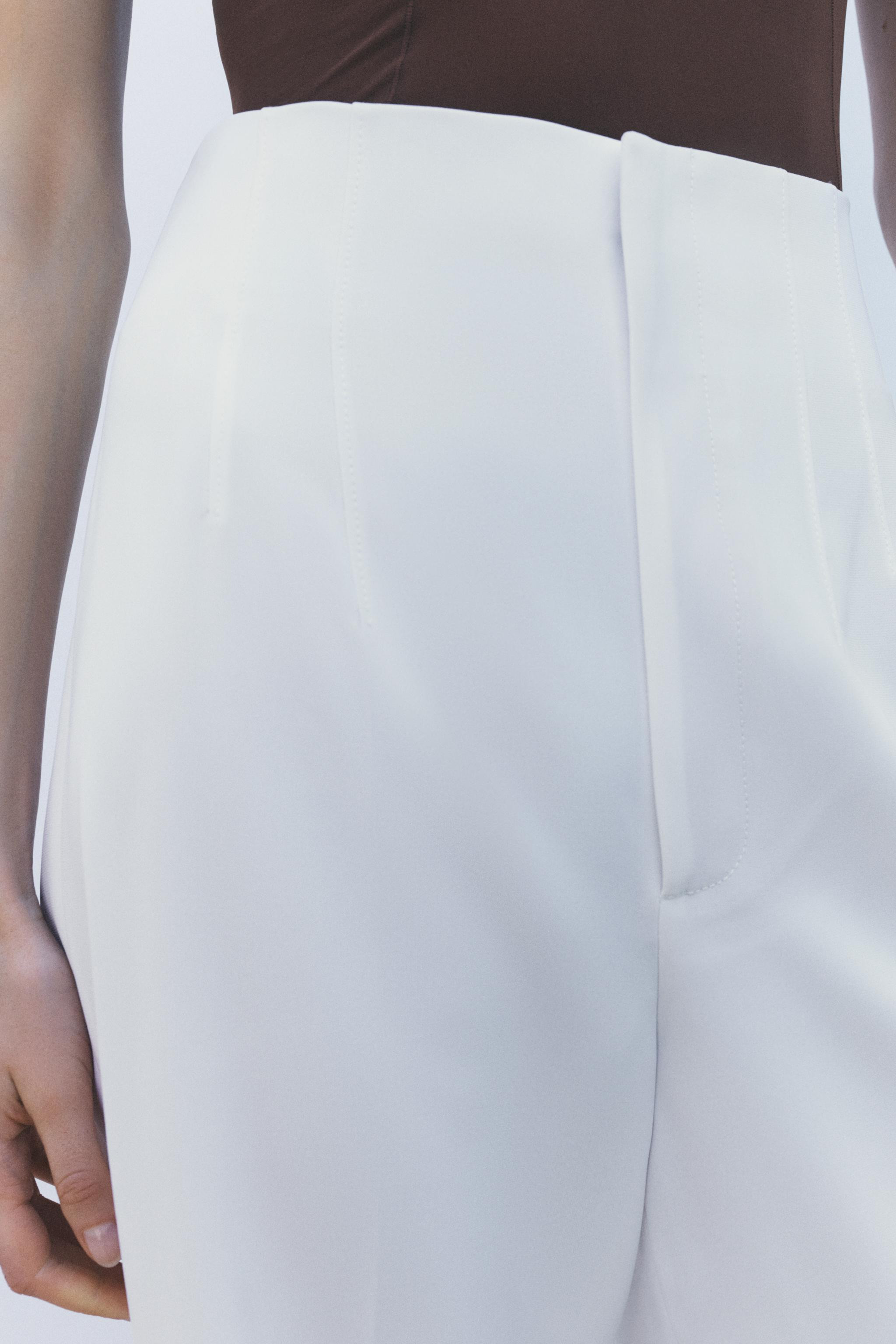 ZARA WOMAN COLLECTIONMid-rise pants with pressed crease detail on front. Straight leg. Front zip,... | Zara US