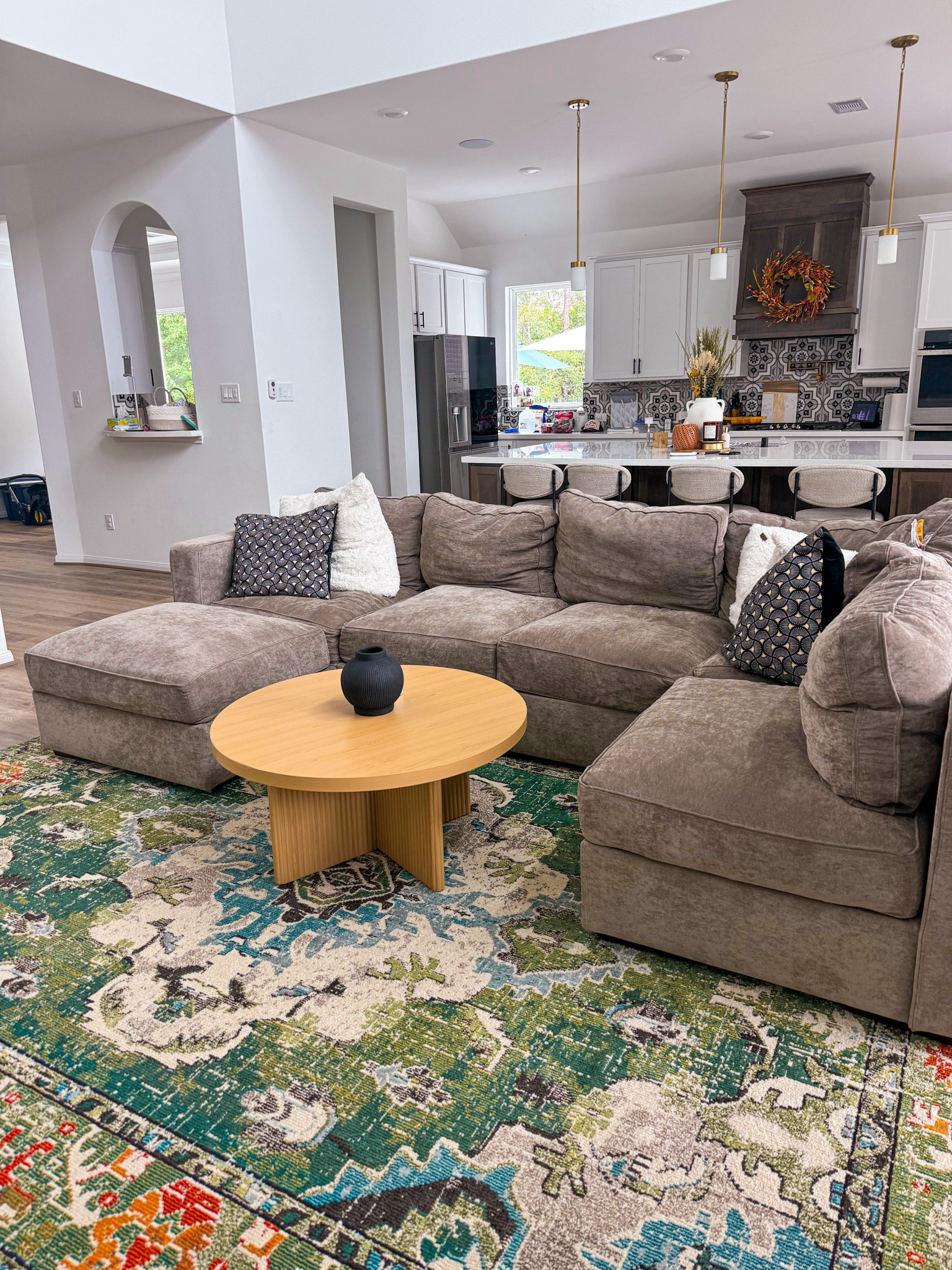 HOME: our living room currently! Trying to add color to our modern decor and loved this rug! Comes in a few color options!

Our lovesac couch is the 6 seats with 7 sides

We have The 9x12 rug in our living room and found for under $300