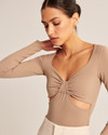 Click for more info about Double-Layered Seamless Fabric Cutout Bodysuit