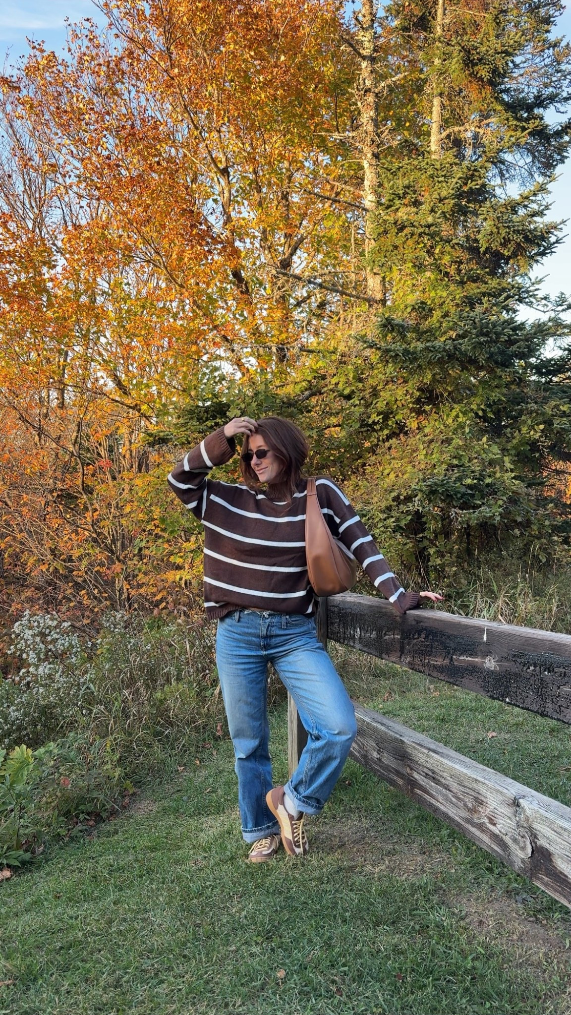 cozy fall brown and white striped sweater and brown sneakers 