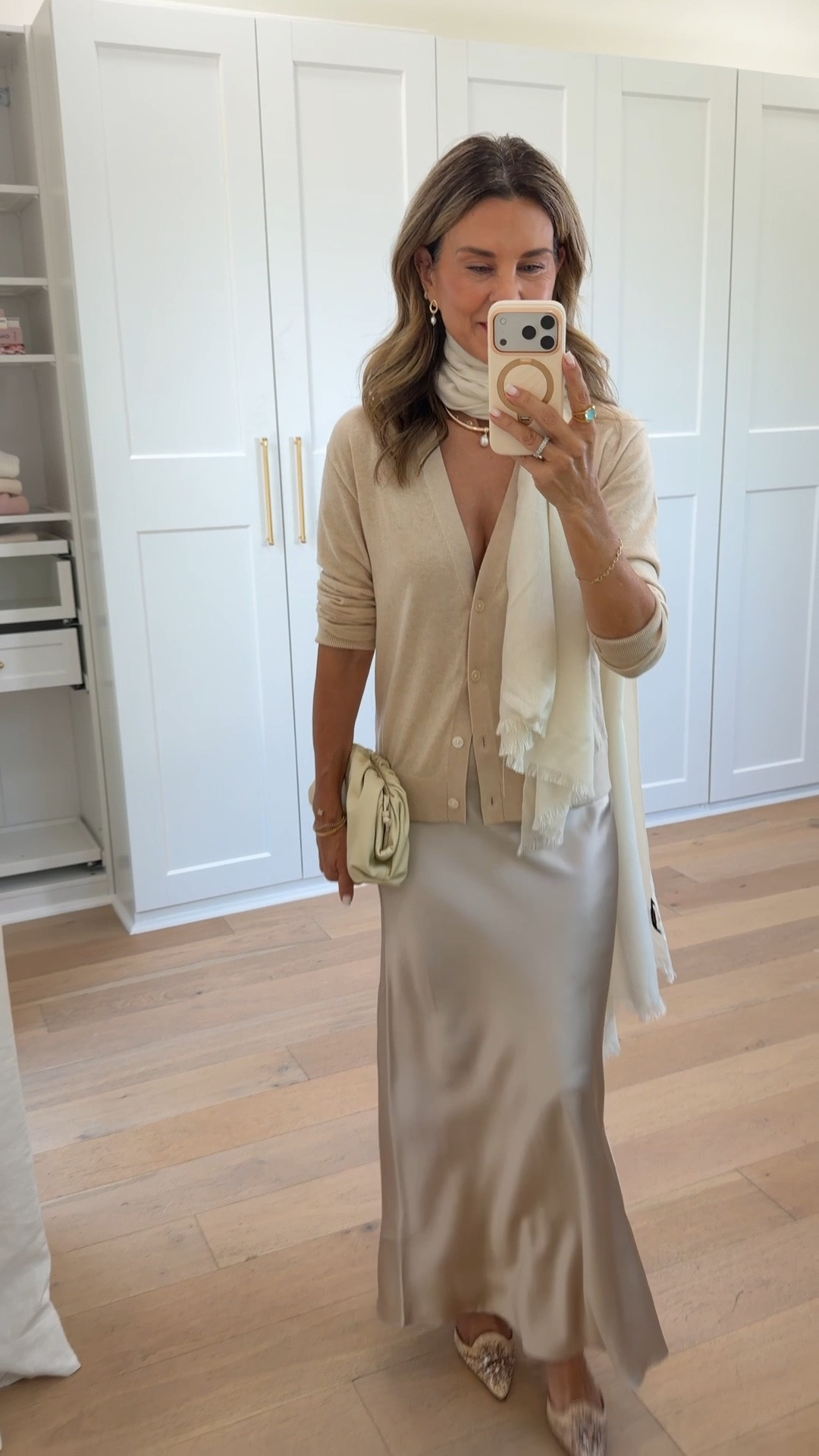 Neutral event ready outfit! I’m 5’6’’
-silk skirt size XS
-merino wool cardigan size XS
-cashmere/silk scarf 
-cream clutch 
-pearl earrings 
@Quince #QuincePartner

#LTKgrwm #LTKOver40 #LTKSeasonal