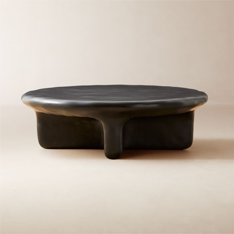 Bodene 50" Round Black Resin Coffee Table + Reviews | CB2 | CB2