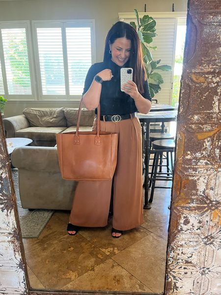 Love this petite friendly wide leg trousers. Perfect for dressing up or down, plus you can wear them year round! I’m wearing small short for reference and am 5’2”. 

#LTKstyletip #LTKworkwear #LTKover40