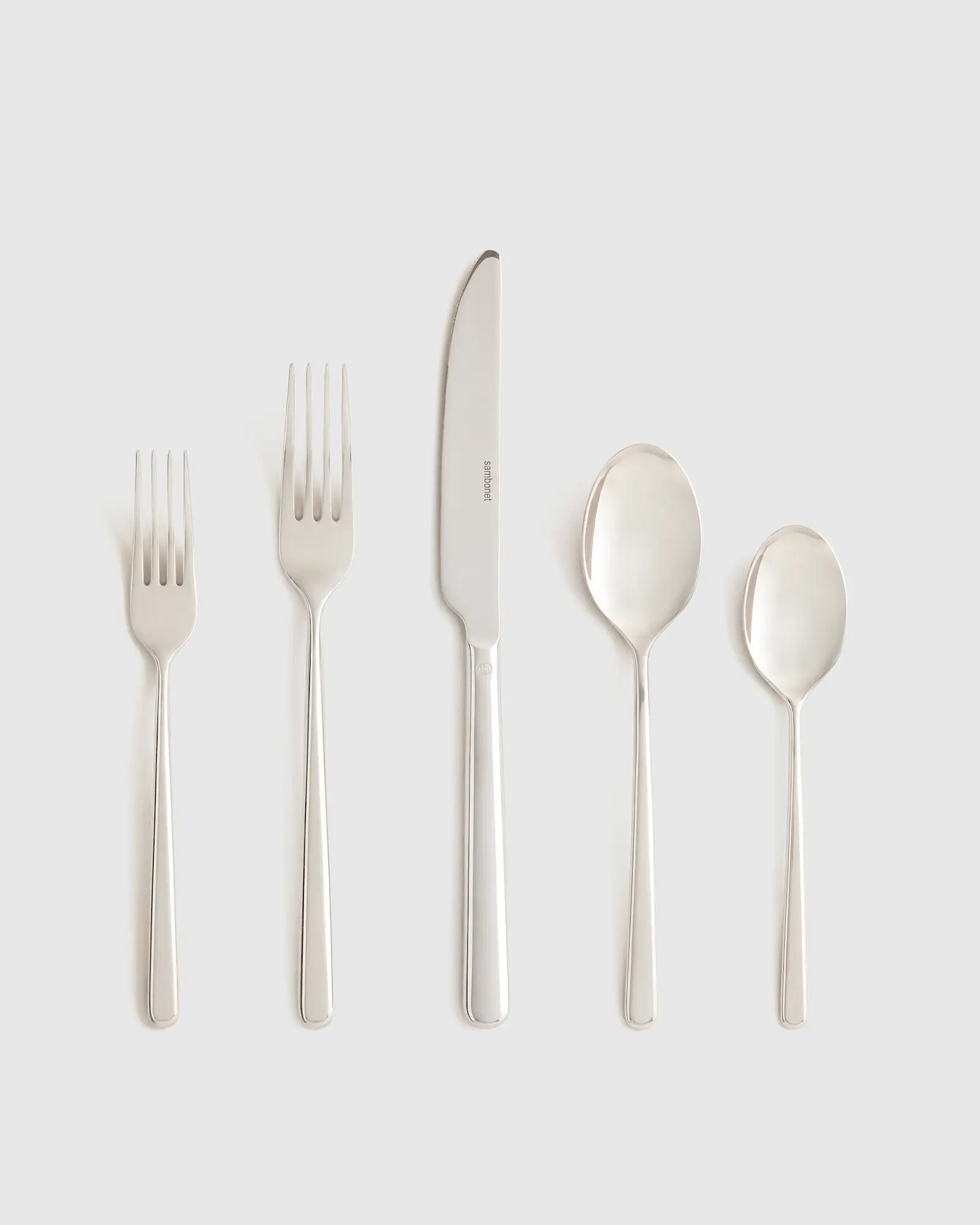 Gia Minimalist 20 Piece Flatware Set in Polished Stainless Steel | Quince