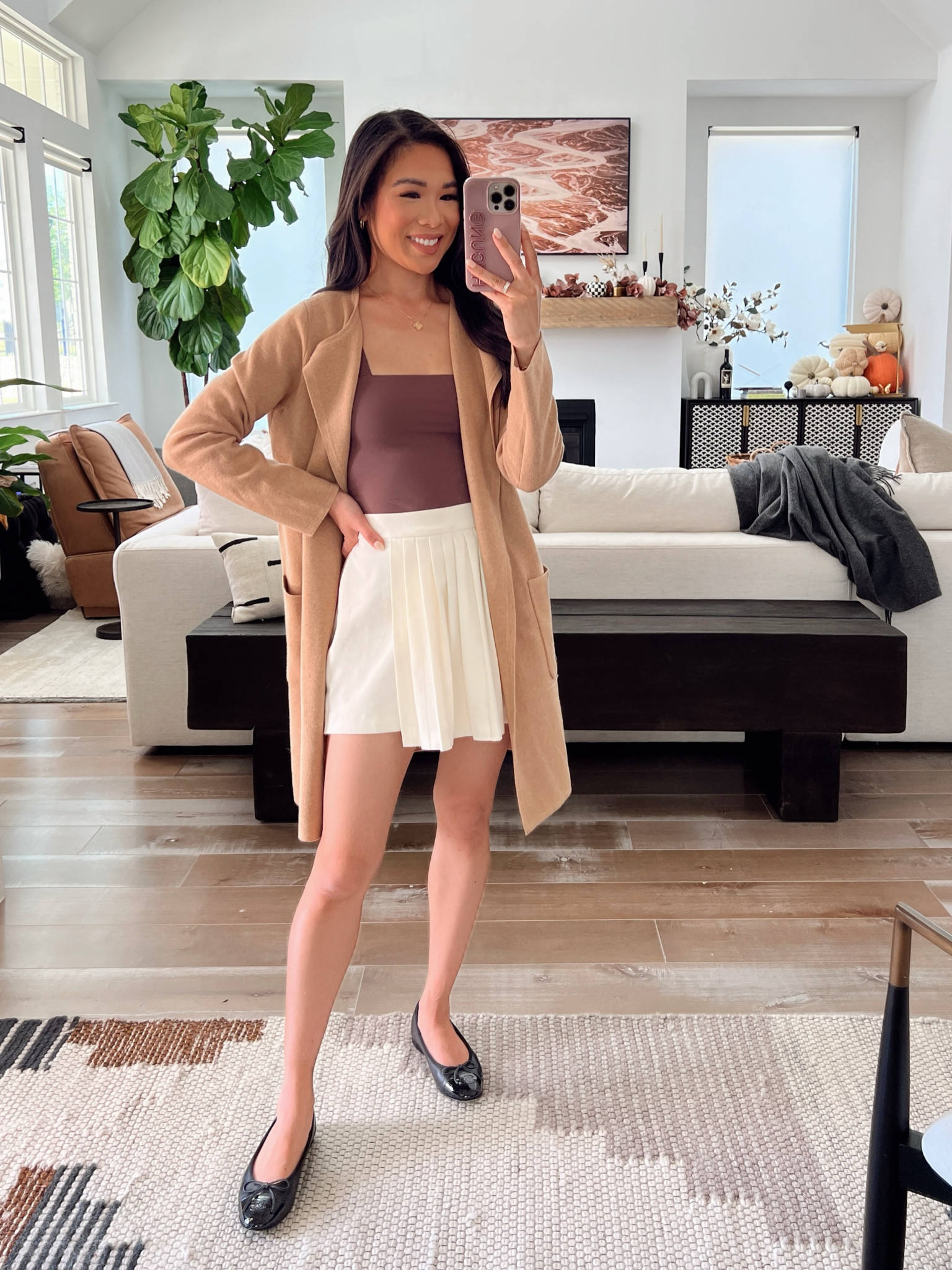 Transitional fall outfit with a brown square neck bodysuit, wrap pleated skort and merino wool blend cardigan that’s 40% off. Wearing size XS in the top and skort and XXS in the cardigan  

#LTKSaleAlert