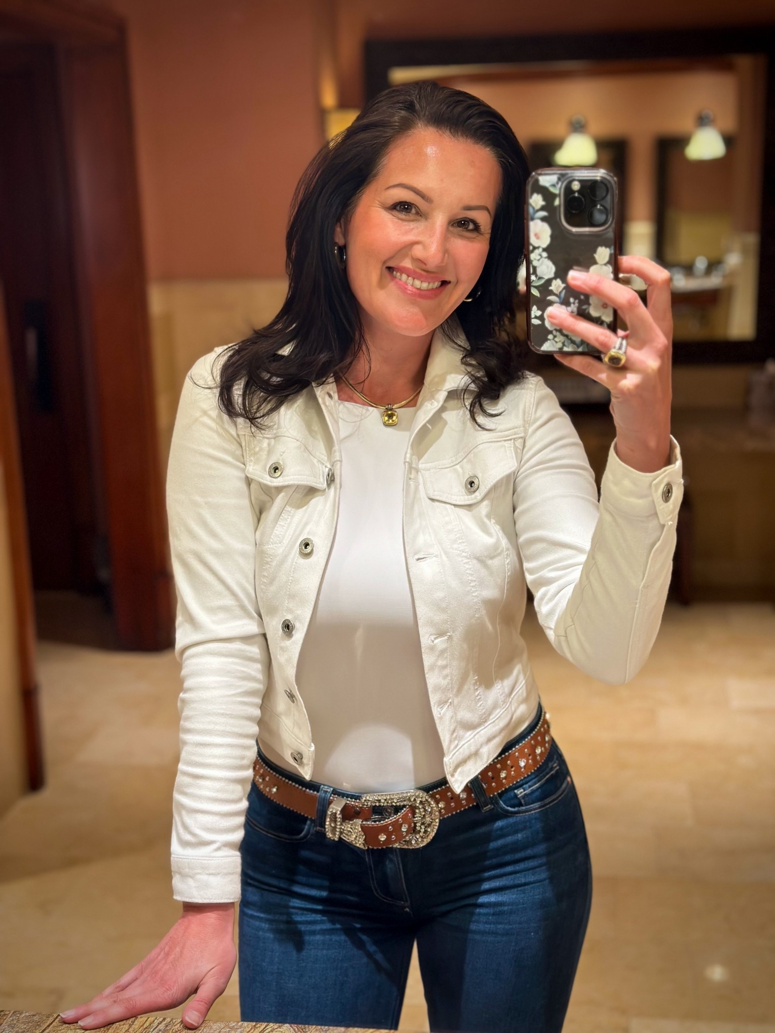 Western-inspired casual outfit featuring a white denim jacket, fitted jeans, and a statement western belt. This elevated western look is perfect for spring outfits, casual travel days, weekend wear, and effortless everyday style. 

#LTKdayinmylife #LTKSeasonal #LTKootd