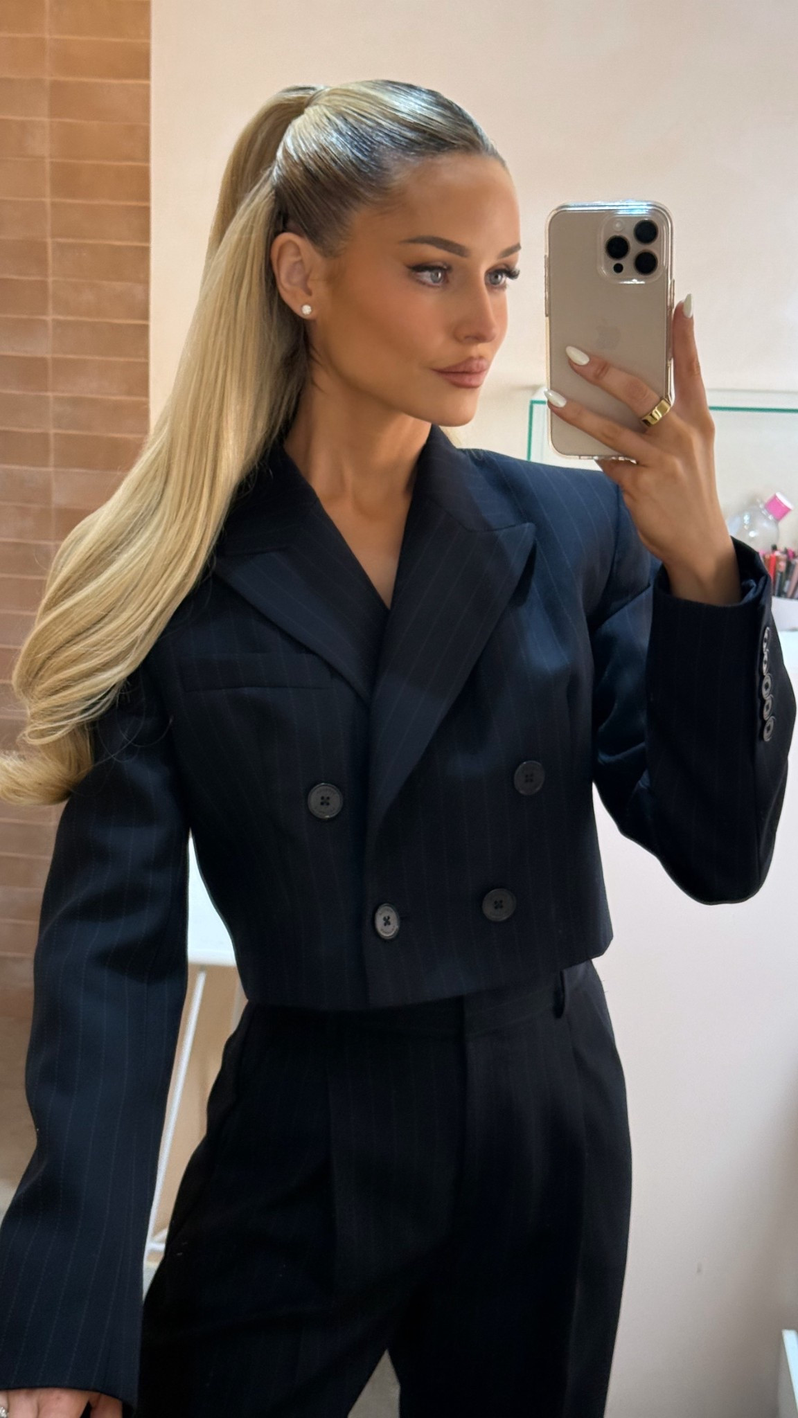 Navy pinstripe cropped blazer and pant 

#LTKaustralia #LTKAroundTheWorld #LTKstyletip
