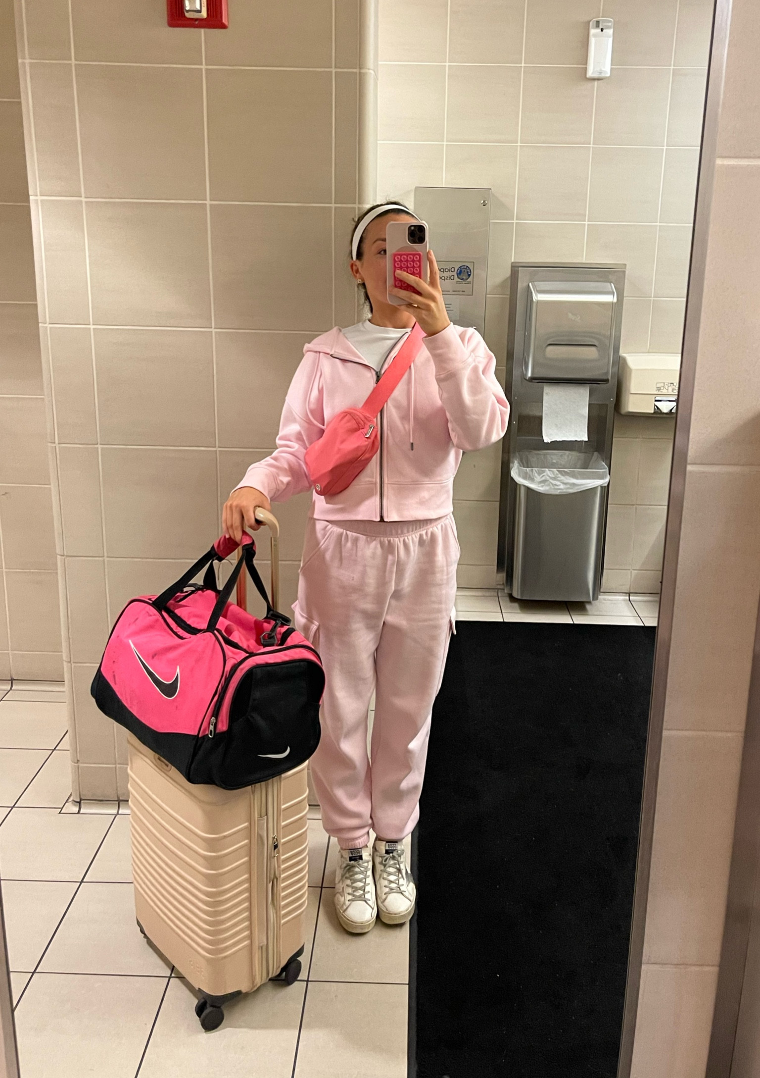 Comfiest airport outfit from target! This pink set is perfect for a long day of travel paired perfectly with the softest basic white tee! My beis luggage is simply superior and the Lululemon belt bag is an airport essential! 

#LTKFindsUnder100 #LTKFitness #LTKTravel