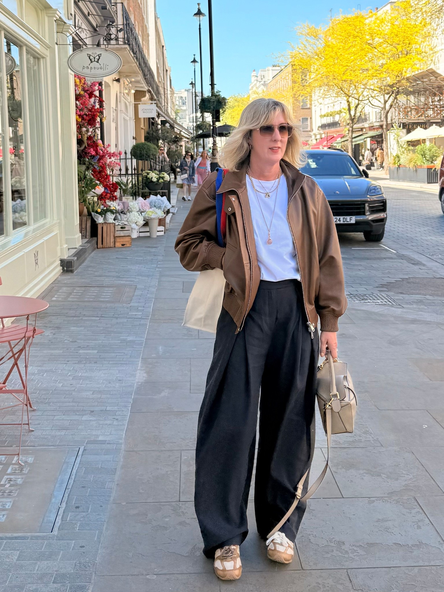 Wide leg trousers and a leather jacket. 

#LTKspring #LTKuk #LTKover50style