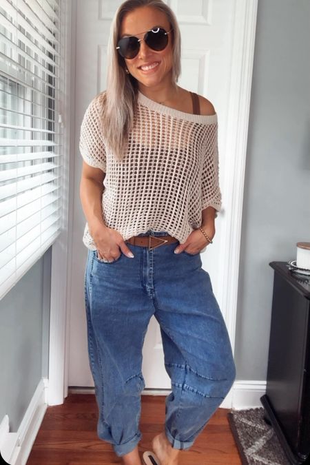 I love the look of these relaxed jeans, super soft and lightweight (I cuffed the bottoms) paired with this cream colored crochet top, a cute brown belt and slides. Run tts.

#LTKOver40 #LTKStyleTip