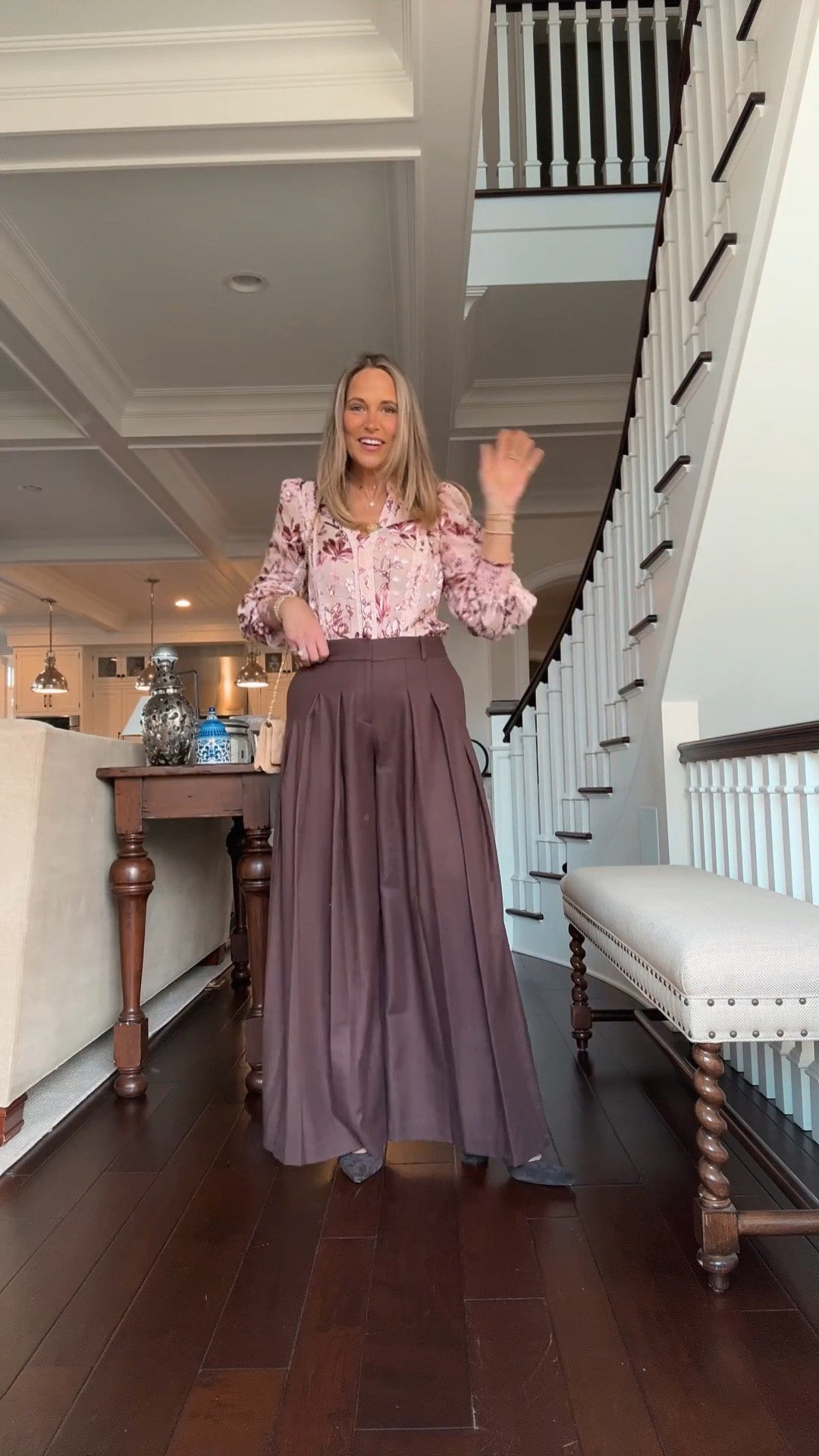 A floral top paired with pleated bottoms creates a feminine, polished look. The combination feels easy to wear while still looking put together. A simple outfit that works for so many occasions.

#LTKMidsize #LTKSeasonal #LTKOver40