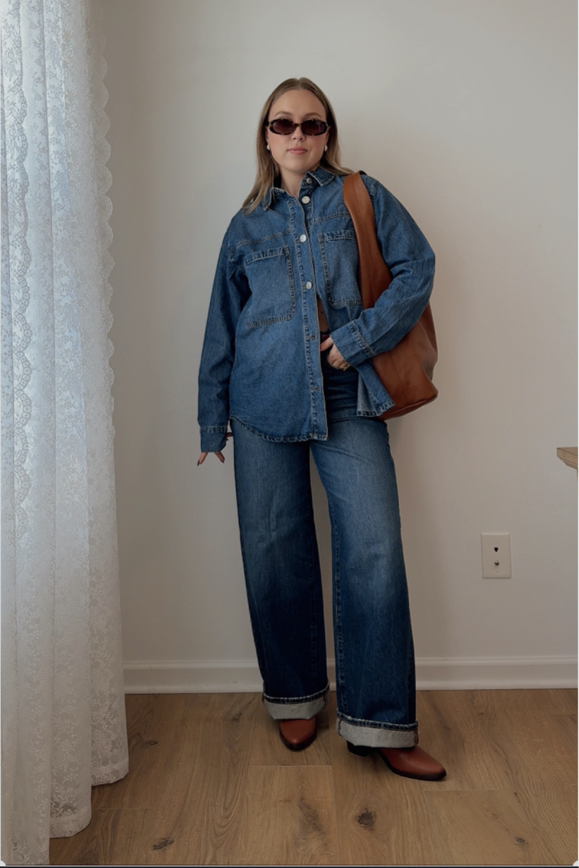 Currently loving denim on denim with brown leather accessories! Wearing a medium in the denim top! My jeans are Madewell superwide in helleran wash. Sold out so linked another jean in the same wash and another Madewell similar wash same stylee


Canadian tuxedo, leather tote bag, purse, brown leather boot, denim jeans, wide leg pants, denim button down shirt, leather brown belt, earrings, jewelry, sunglasses, fall outfit, womens fashion, neutral look, chic style


#LTKStyleTip #LTKWorkwear #LTKItBag
