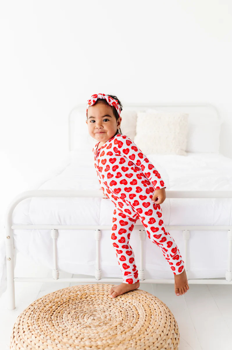 Red Affirmation Heart Footed Convertible Foot Onesie | Little Pajama Co.
