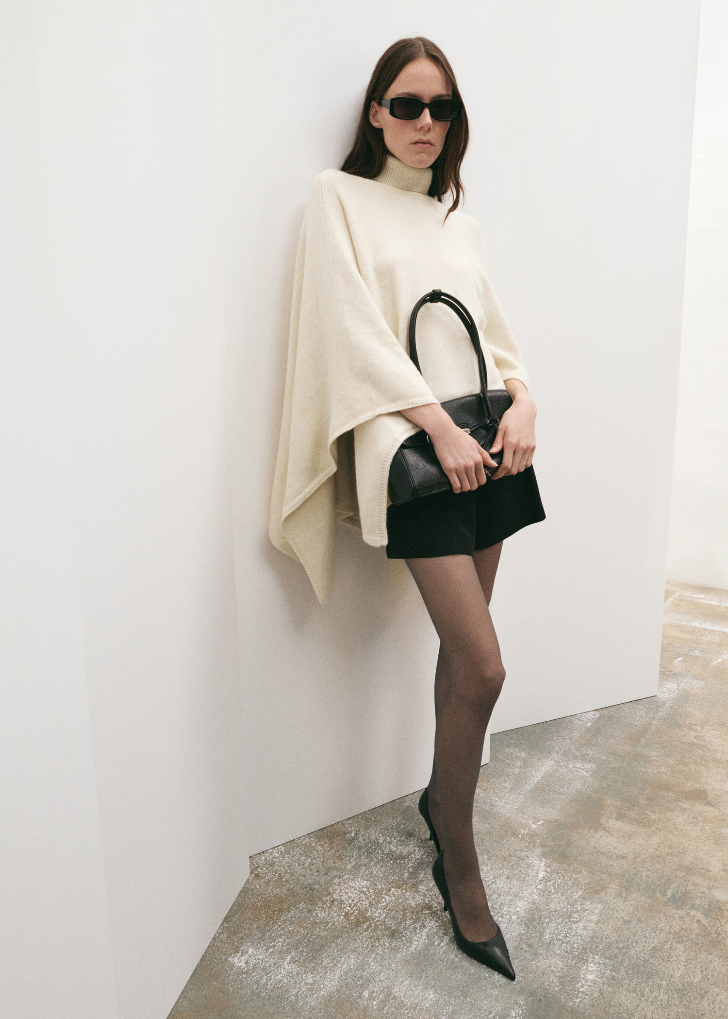 Knitted turtleneck cape | MANGO (UK)
