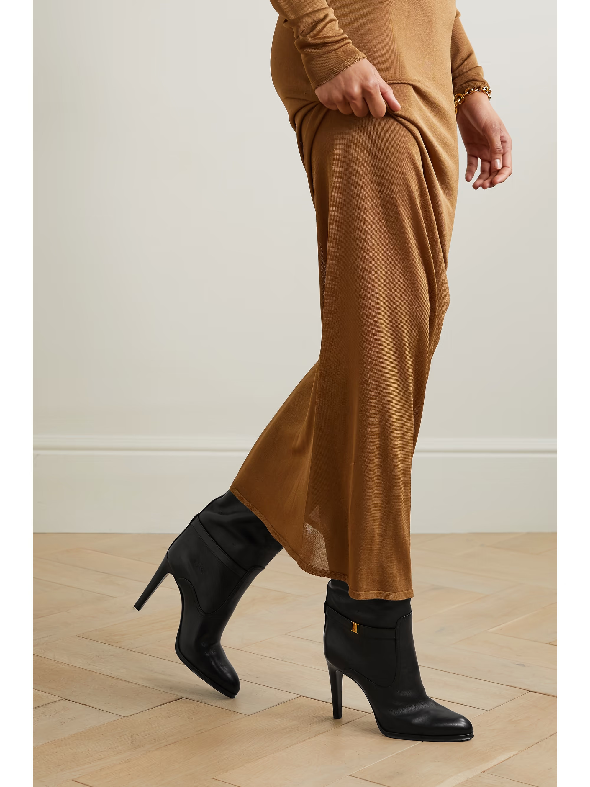 PORTER declares "knee-high boots are the trophy piece of any great footwear collection," so it's ... | NET-A-PORTER (US)