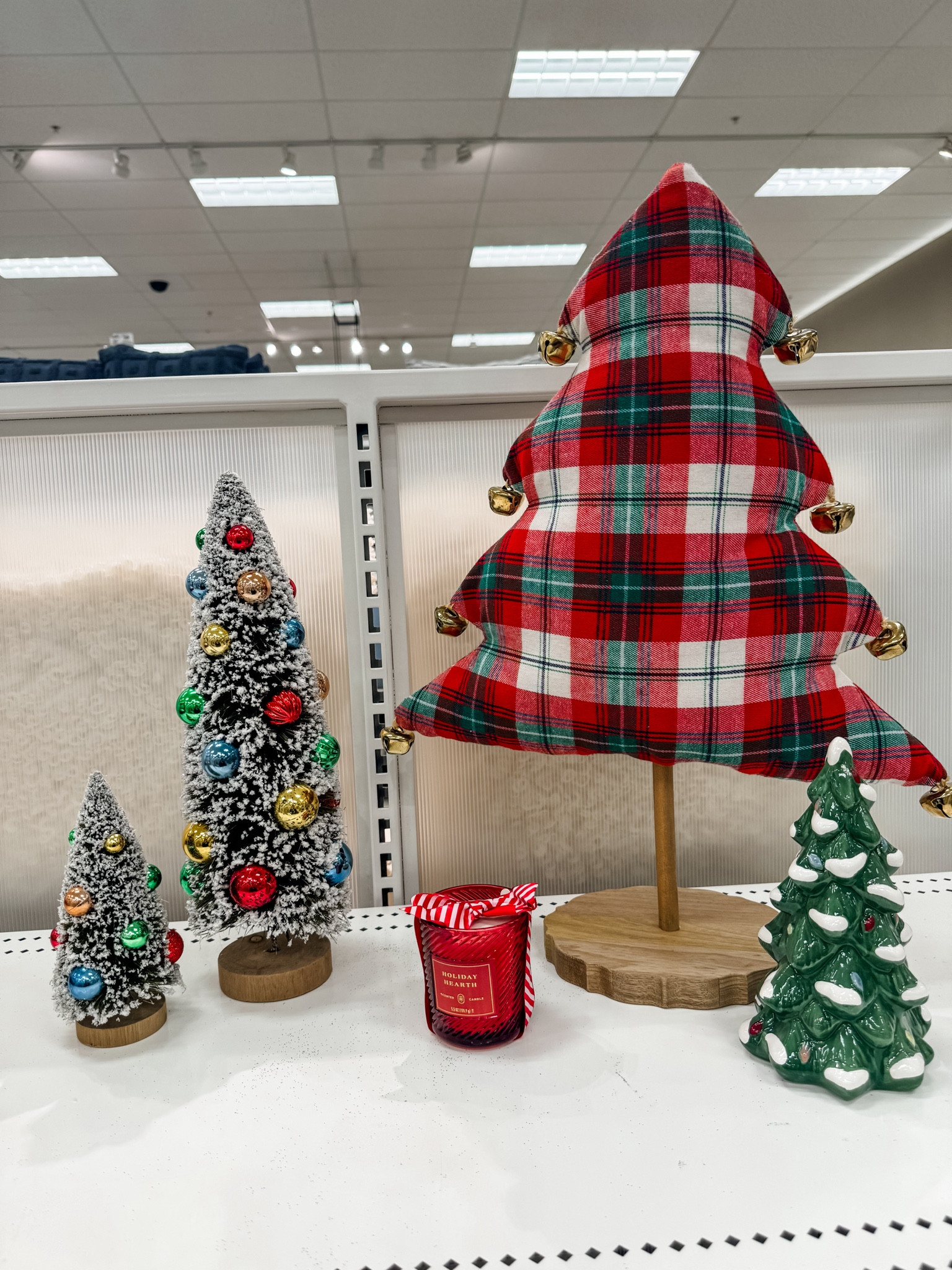 Holiday decor is officially hitting the shelves, and I'm obsessed with this cozy, classic look! ❤️💚 The plaid fabric tree is such a fun statement piece. Which one of these mini trees is your favorite? Perfect for mantels, shelves, or a little office cheer!

#christmasdecor #holidaydecor #targetfinds #plaidchristmas #minitrees #cozychristmas #christmasinspo #ltkhome