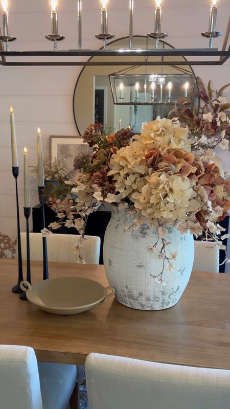 Fall Floral Arrangement. Follow @farmtotablecreations on Instagram for more inspiration. 🍂Vase & Stem Sale. This gorgeous Pottery Barn Vase & fall stems are currently on sale. Table centerpiece. Tablescape. Candlesticks. Studio McGee Bowl. Fall Centerpiece. Fall Floral Arrangement. 

For reference:
4 toast hydrangea stems
5 brown hydrangea stems
3 brown floral branch stems
5 mini maple leaf sprays


#LTKunder50 #LTKhome #LTKsalealert