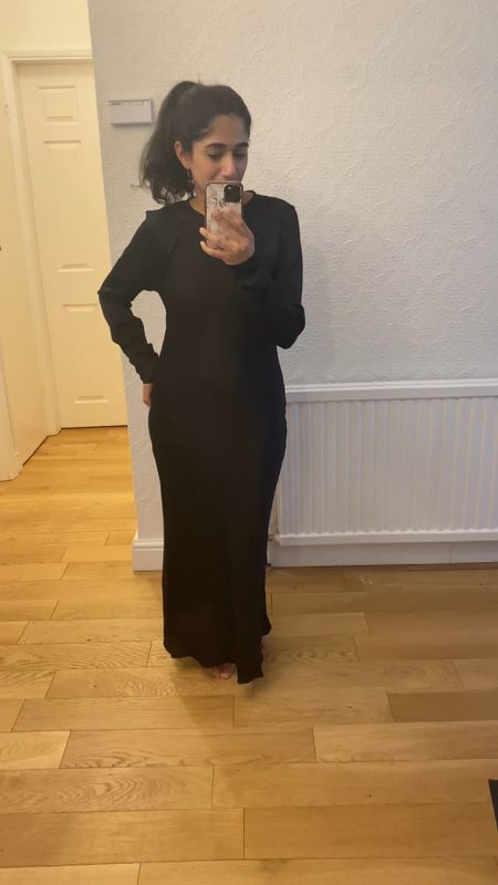 This dress is dreamy! Black satin dress and perfect for Eid. Great modest dress for Ramadan too