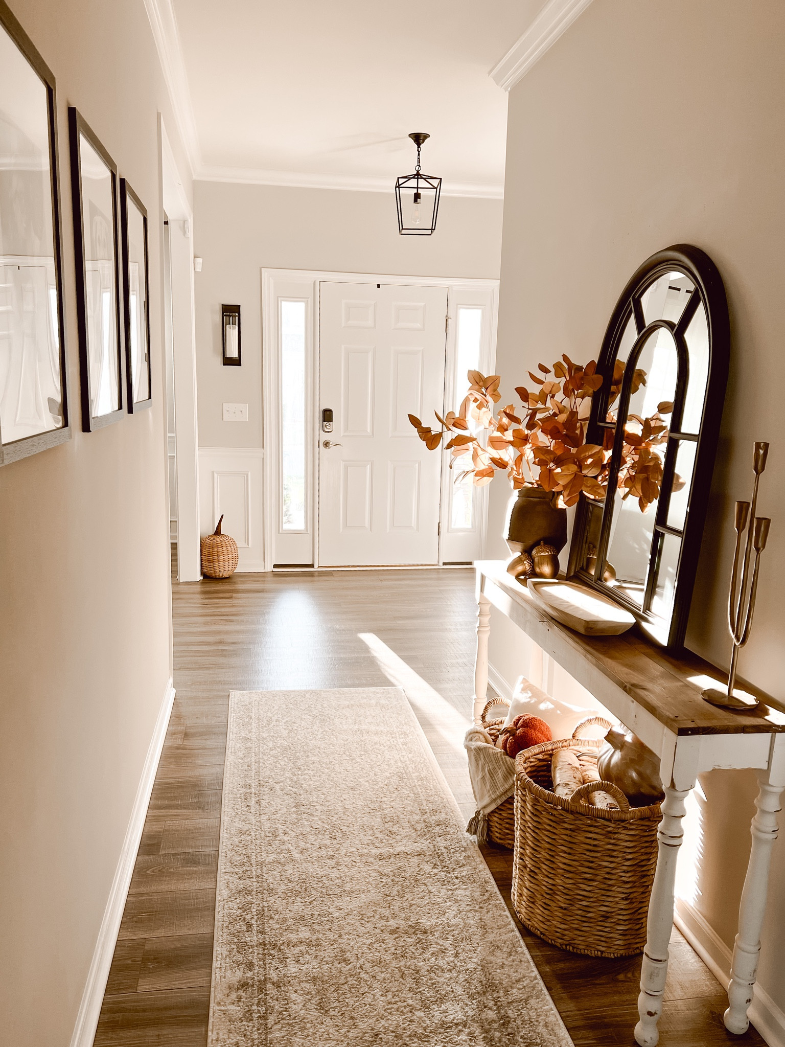 Rug, entryway, entryway table, vase, vessel, rustic, fall stems, mirror, picture frames, framed art, wall art, hallway, table, wood, rattan pumpkin, decor, entryway decor, pendant light, front entryway, candle holder, baskets, throw blanket, decor inspo 


#ltkhome #ltkdecor