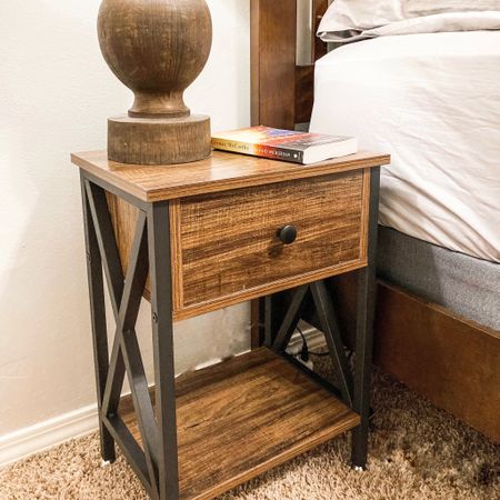 Rustic bedside table or end table is perfect for a masculine room. The black metal adds an industrial feel to nightstand. 

#LTKfindsunder50 #LTKstyletip #LTKhome