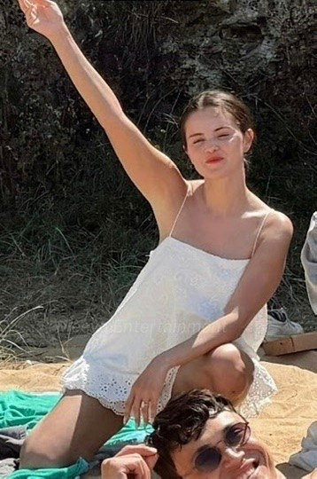 Selena Gomez  white eyelet ruffle dress ￼